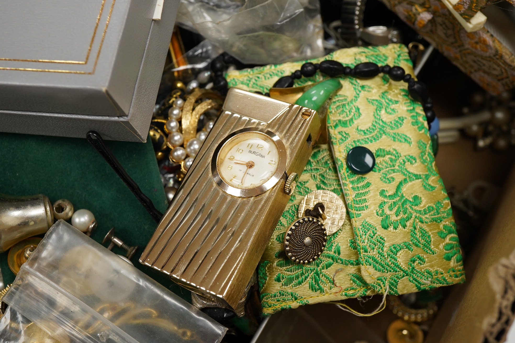 A quantity of assorted mainly costume jewellery, including paste brooch, facetted jet bead necklace, enamelled earrings, wrist watches, compact, lighters, etc.